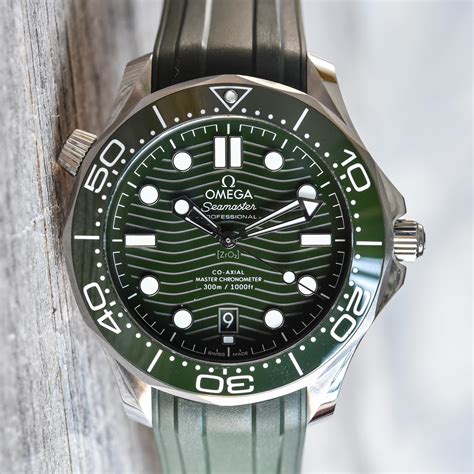 omega water resistance black face green hands mens watch|omega seamaster watch features.